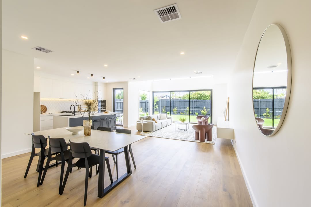 Penthouse kitchen with recessed lighting and ocean views